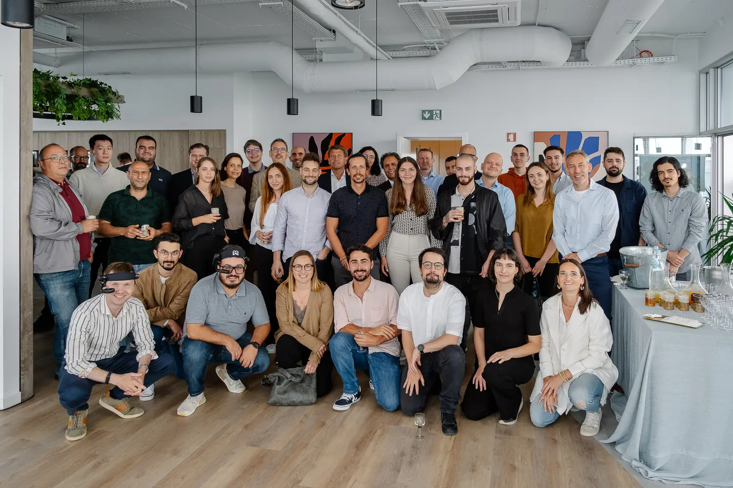 Group of employees in office on opening day